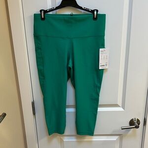 Athleta Kelly Green Interval Stash 7/8 Tight Leggings Size Large Petite